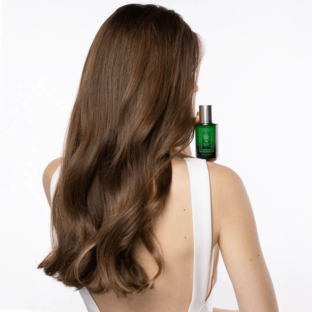 The Hair Multiplier held over the shoulder